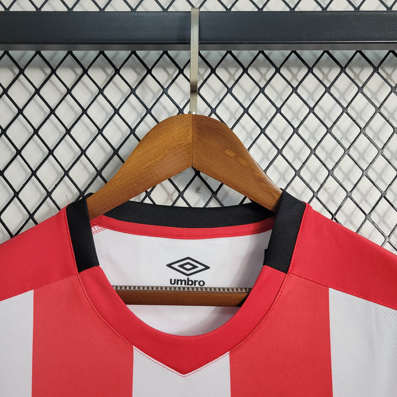 Camisa Brentford I 23/24 Umbro - Vermelho e Branco