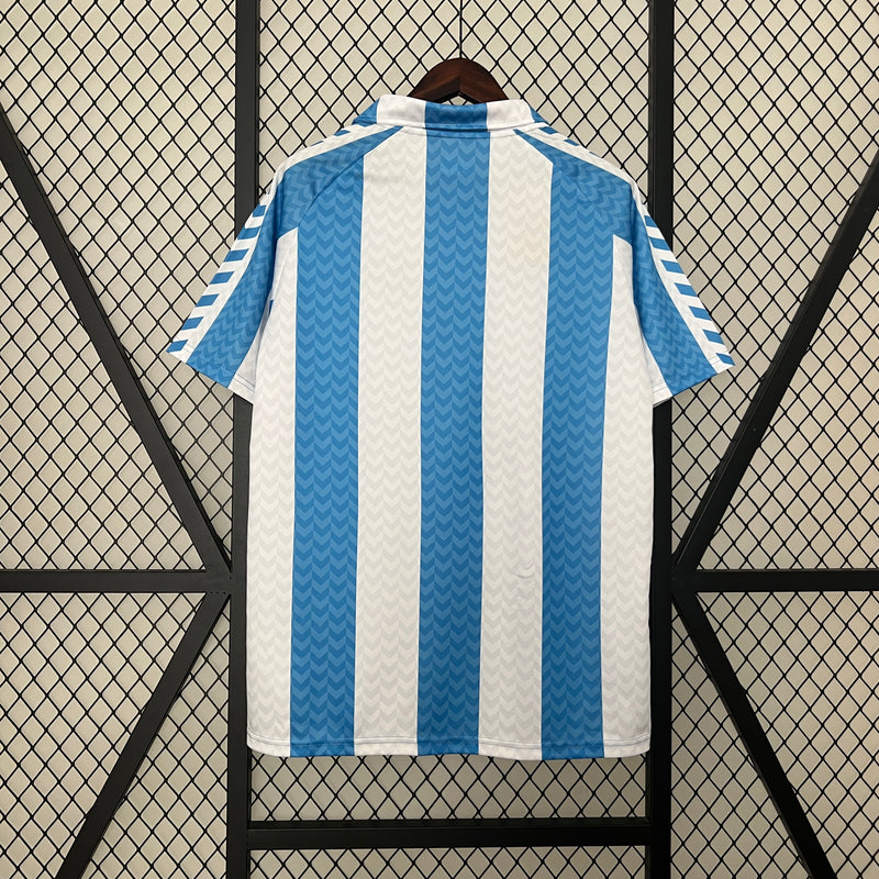 Camisa Málaga Retrô Aniversário 120 anos Hummel - Azul e Branca